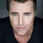 Paul McGillion به عنوان Blake Davis