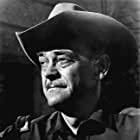 John McIntire به عنوان Sheriff Al Chambers