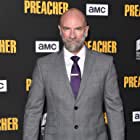 Graham McTavish به عنوان Tommy Holiday