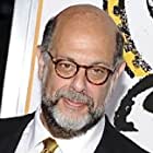 Fred Melamed به عنوان Mr. Irving