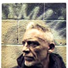 Callum Keith Rennie به عنوان Asher Talos