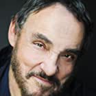 John Rhys-Davies به عنوان Warnie