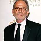 Ron Rifkin به عنوان Carl