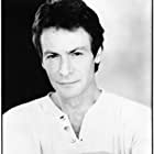 Robin Sachs به عنوان Mr. Bowman