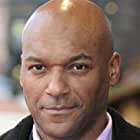 Colin Salmon به عنوان Father Quinn