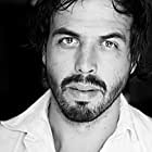 Angus Sampson به عنوان John Hansen