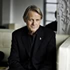 William Sanderson به عنوان E.B. Farnum