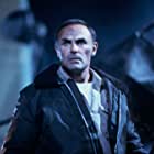 John Saxon به عنوان Roper