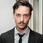 Tom Schilling به عنوان Björn Diemel