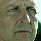 Nick Searcy به عنوان Capt. Saunders