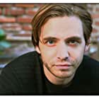 Aaron Stanford به عنوان Seymour Birkhoff