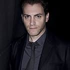 Michael Stuhlbarg به عنوان Mr. Besegai