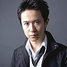 Tomokazu Sugita به عنوان Taro Sakamoto