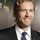 Brett Tucker به عنوان Singed