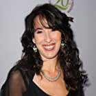 Maggie Wheeler به عنوان Janice