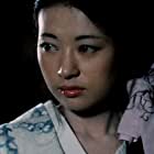 Kazuko Yoshiyuki به عنوان Professor Konaka's wife