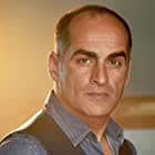 Navid Negahban به عنوان Rashid