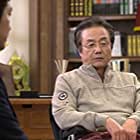 Jung Dong-hwan به عنوان Teacher Baek