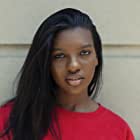 Mikayla Lashae Bartholomew به عنوان Tunde Price