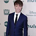 Calum Worthy به عنوان Taylor