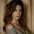 Michelle Monaghan به عنوان Angie Gennaro