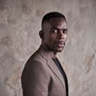 Jimmy Akingbola به عنوان Carter