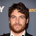 Adam Pally به عنوان Guard Paolo