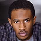 Malcolm David Kelley به عنوان Dennis