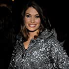 Kimberly Guilfoyle به عنوان Self - Former Prosecutor, Legal Commentator, and Fox News Host