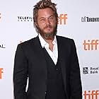 Travis Fimmel به عنوان Lyle Orlik