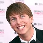 Jack McBrayer به عنوان Leslie