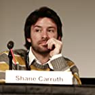 Shane Carruth به عنوان Coroner