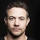 Warren Brown به عنوان Sgt. Thom'Mac' McAllister