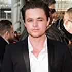 Harrison Gilbertson به عنوان Eron Keen