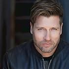 Damon Runyan به عنوان Nolan