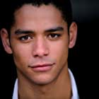 Charlie Barnett به عنوان Alan Zaveri