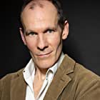 Simon Paisley Day به عنوان DouglCarswell