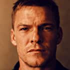 Alan Ritchson به عنوان Agent Carver