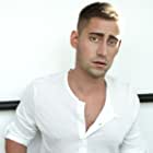 Michael Socha به عنوان Giorgi