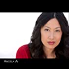 Angela Ai به عنوان Monica (Court Clerk)