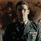 Josh Helman به عنوان Scrotus