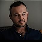 Daniel Henshall به عنوان Dolly