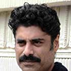 Sikandar Kher به عنوان John Mascarenhas