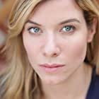 Tessa Ferrer به عنوان Audrey Rainier