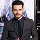 Michael Malarkey به عنوان Captain Michael Quinn