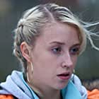 Lily Loveless به عنوان Naomi