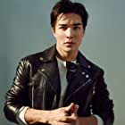 Ludi Lin به عنوان Zack (Black Ranger)