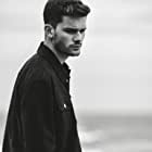 Jeremy Irvine به عنوان Daniel Grigori