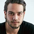 Daniel Zovatto به عنوان Greg Hannigan