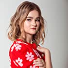 Millicent Simmonds به عنوان Regan Abbott